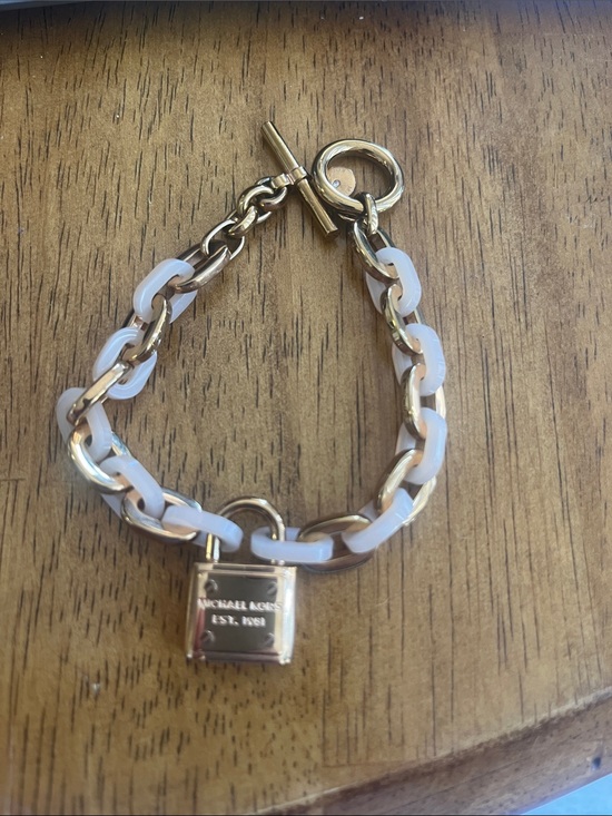 Michael Kors Jewelry - Michael Kors Gold and White Link Chain Bracelet with Padlock Charm